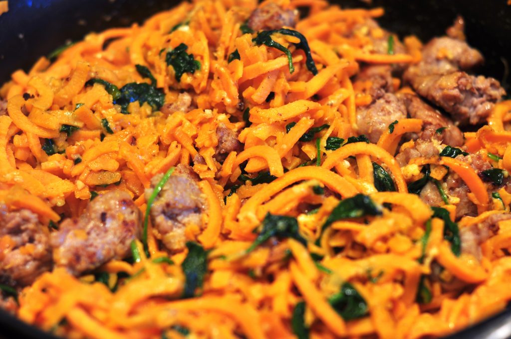 sweet potato noodles with sausage and baby spinach
